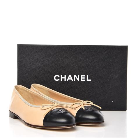 chanel beige and black flats.